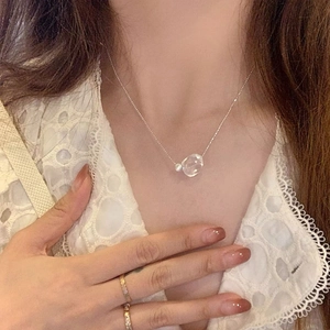Irregular clear crystal necklace with 925 silver beads chain worn on model with lace