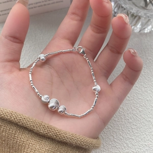 Minimalist S925 sterling silver beaded bracelet featuring matte finish beads and lobster clasp