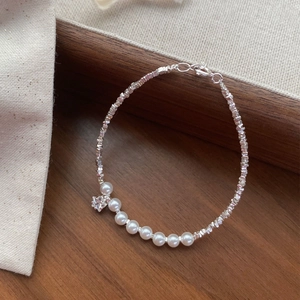 Elegant S925 sterling silver pearl bracelet with crushed silver beads and star charm