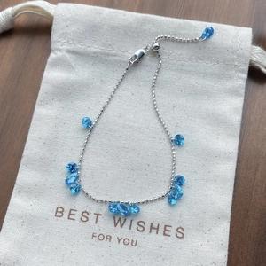 925 sterling silver bracelet featuring blue teardrop zircons and adjustable slider clasp