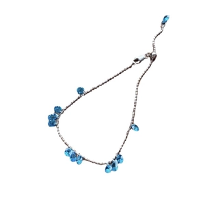 Elegant 925 sterling silver bracelet featuring blue water drop zircon stones and adjustable link