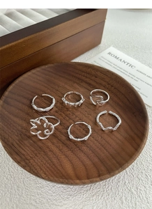 Detail of 6-piece S925 sterling silver minimalist ring set with s925 hallmark on inner band