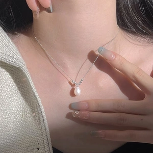 Elegant S925 sterling silver necklace featuring a teardrop freshwater pearl pendant