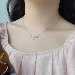 S999 sterling silver wheat ear necklace with a waterdrop zircon pendant on a model