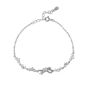 Elegant S999 sterling silver bow bracelet with sparkling cubic zirconia stones