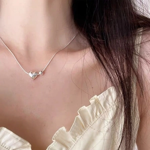 Elegant S925 sterling silver heart pendant necklace on a delicate bead snake chain