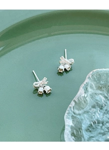 Detail of S925 sterling silver lily of the valley earrings with a delicate bowknot design