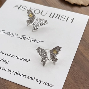 S925 sterling silver hollow butterfly stud earrings with two-tone gold and silver design