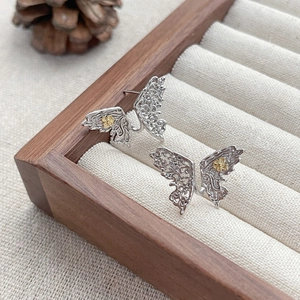 Handcrafted S925 sterling silver butterfly earrings with golden flower filigree detail