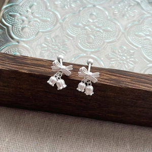 Elegant S925 sterling silver lily of the valley bow earrings with matte finish