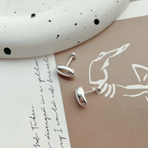 Polished S925 sterling silver oval bean stud earrings with screw backs on art card