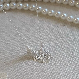 Elegant S925 sterling silver tassel chain necklace for women on minimalist canvas