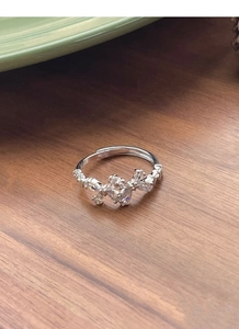 Macro detail of S925 sterling silver bow ring with marquise cubic zirconia stones