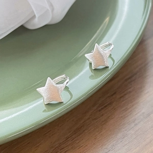 Minimalist S925 sterling silver star hoop earrings with a brushed matte finish for women