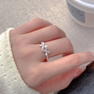 Elegant S925 sterling silver bow ring with marquise zircon stones on finger