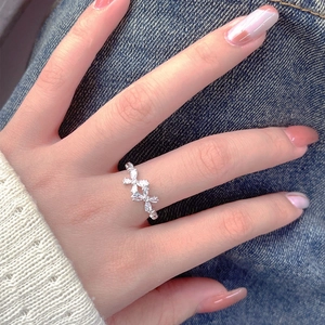 Elegant S925 sterling silver bow ring with marquise zircon stones worn by a model
