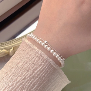 Elegant S925 sterling silver double-layer bracelet with white pearls and olive beads