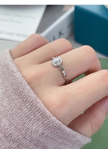 Macro view of adjustable S925 sterling silver chain ring featuring a square diamond center