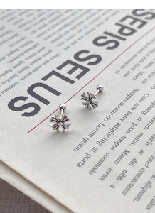Detailed close-up of retro S925 sterling silver cross stud earring with screw back