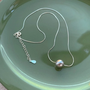 Elegant S925 sterling silver snake chain necklace with a round grey pearl pendant