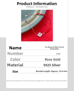 Détail du bracelet S925 argent avec breloque Fu et cordon rouge et chaîne en or rose