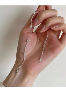 Close-up of S925 sterling silver beaded knot bracelet with lobster clasp and extension chain