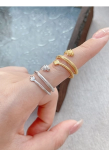 Macro detail of the dual-layer silver dragon ring featuring intricate scale textures