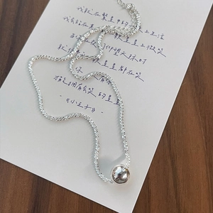 S925 sterling silver necklace featuring a shimmering bead pendant and faceted chain