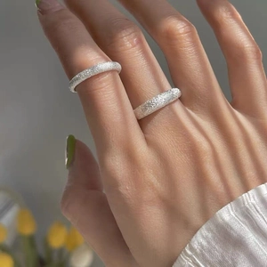 Sparkling S925 sterling silver frosted rings shown on hand in minimalist style