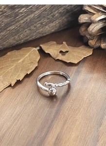 Detail of S925 sterling silver stamp on minimalist adjustable beaded ring for women