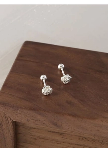Detailed close-up of S925 sterling silver camellia stud earrings with screw back closure