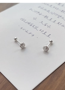 Detailed close-up of S925 sterling silver camellia stud earrings with screw back design