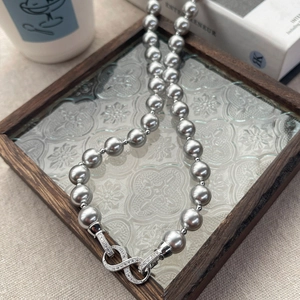 Elegant S925 silver grey pearl necklace featuring a diamond-set infinity buckle design