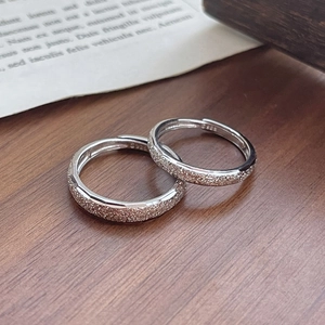 Frosted S925 sterling silver couple rings set with minimalist design and textured finish