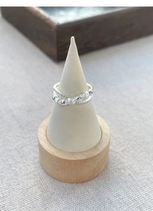 Detail of S925 sterling silver double cross ring with pavé zircons and textured beads