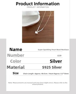Macro shot of S925 sterling silver heart bead necklace with adjustable extension chain