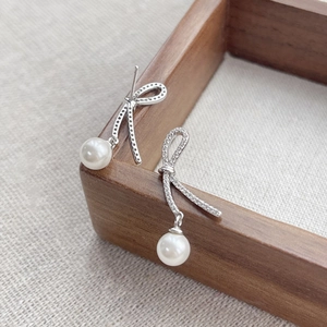 Elegant S925 silver bow ribbon earrings with shiny pearl pendants and zircons