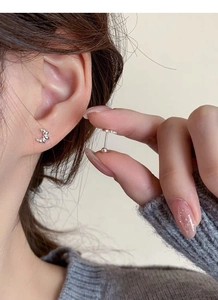 Detailed view of S925 silver beaded crescent stud earrings with secure screw back closure