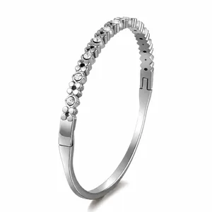 Elegant silver stainless steel bangle with sparkling embedded crystals for women