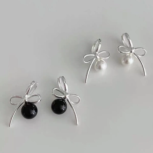 S925 sterling silver bow earrings with black agate and white pearl charms in a pair