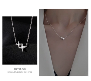 Close-up of S925 sterling silver necklace featuring two interlocking zircon stars