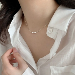 Elegant S925 sterling silver necklace with three rice-shaped beads on a dainty snake chain
