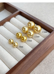 Detailed view of four sizes of gold S925 silver pearl earrings from 8mm to 14mm