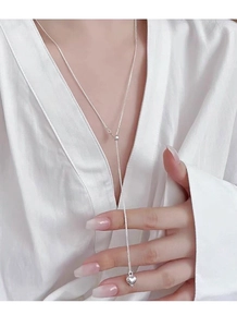 Close-up of adjustable Y-shaped S925 silver necklace featuring a polished heart pendant