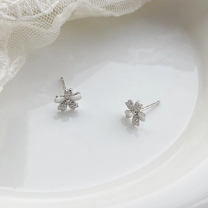 Sparkling S999 silver cherry blossom stud earrings with inlaid crystals on white lace