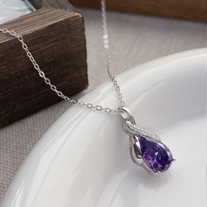 Elegant S925 sterling silver necklace with a pear-shaped purple gemstone pendant