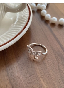 Macro shot of S925 sterling silver stamp and zircon details on 3D butterfly ring