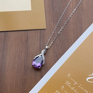 S925 sterling silver necklace featuring a purple teardrop pendant and crystal accents