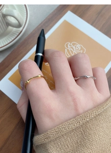 Irregular textured S925 sterling silver rings in gold and silver finish worn together