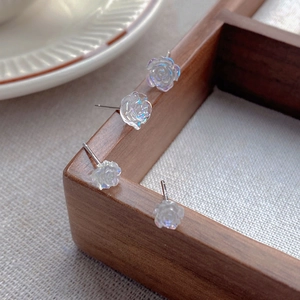 Minimalist S925 silver camellia stud earrings with iridescent aurora resin petals